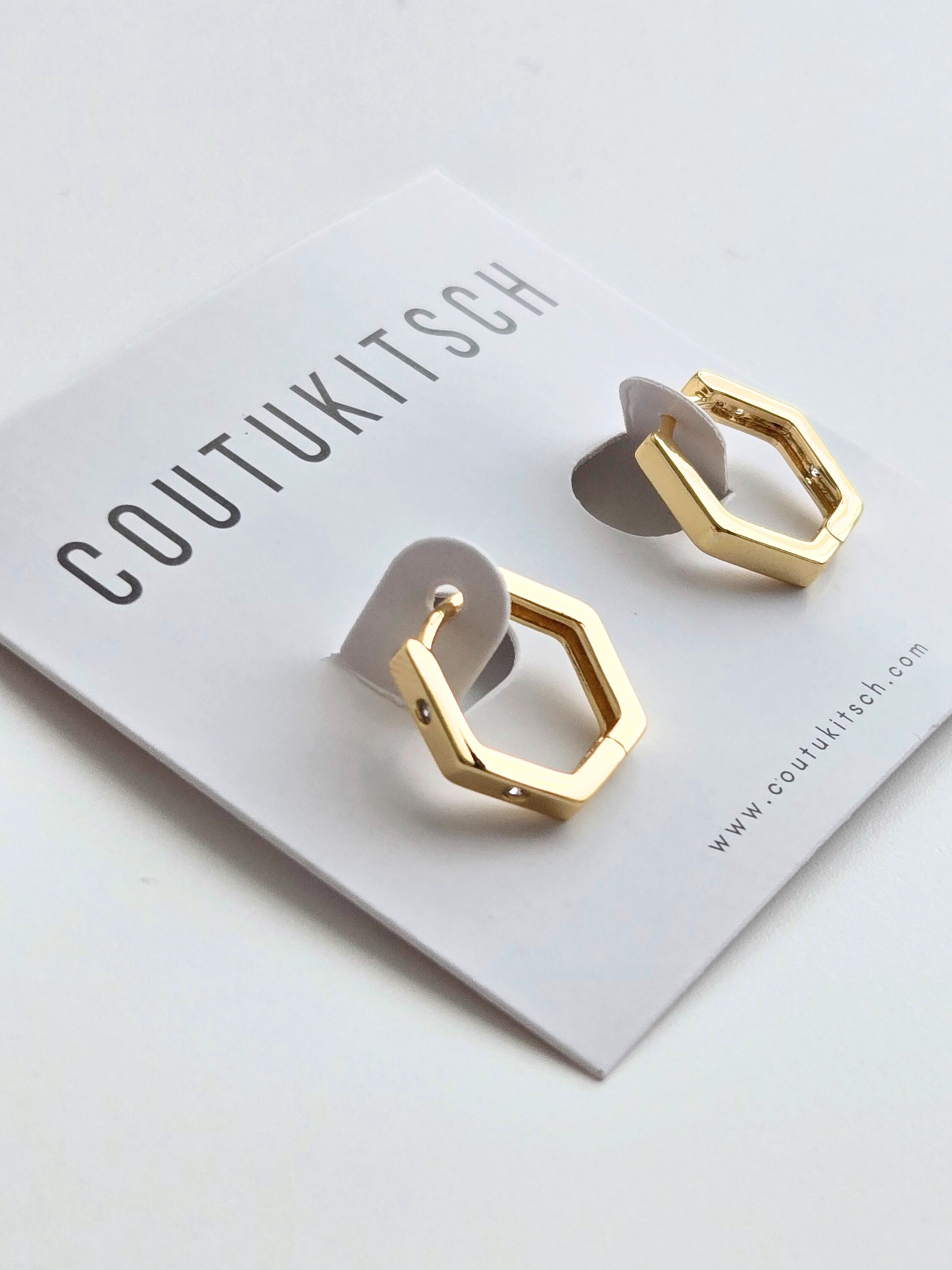 010 | hexagon crystal huggie hoops