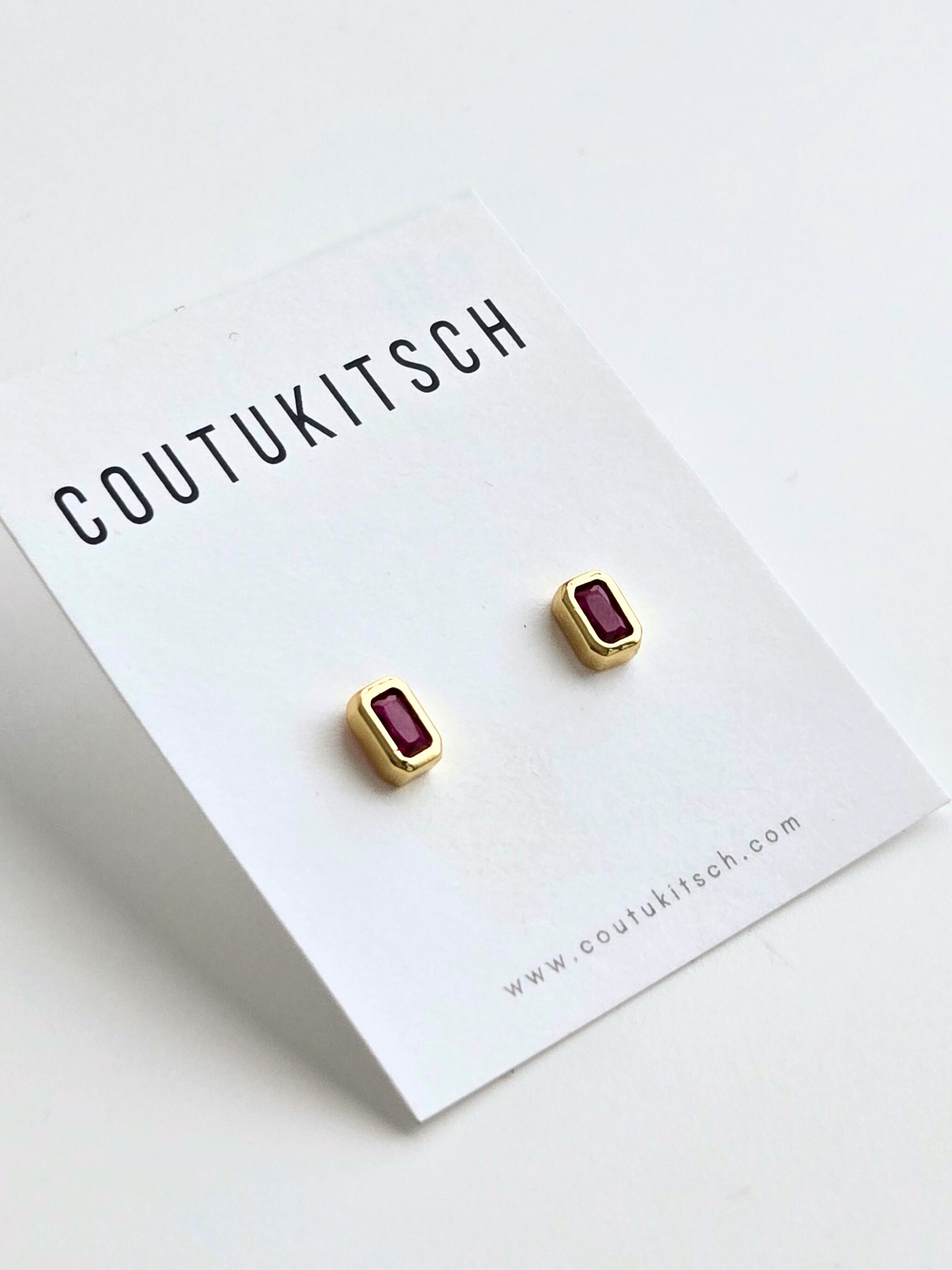 014 | dark pink baguette studs