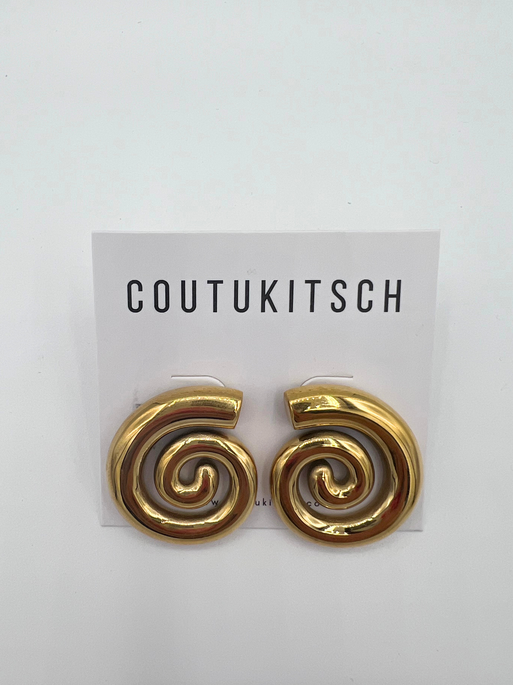 024 | large swirly studs